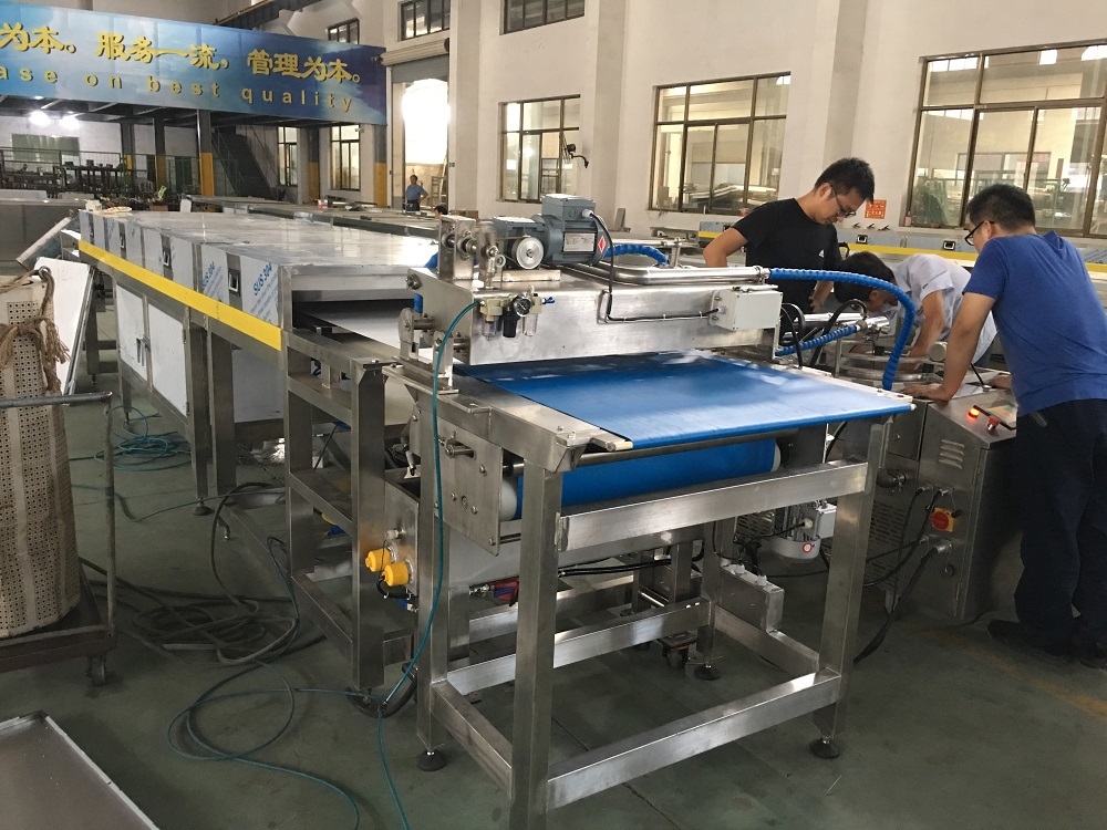 Najnowsze blogi firmy Przewodnik po wyborze linii do dekoracji i chłodzenia popcornu – Kluczowe czynniki od kontroli procesu do wydajności produkcji